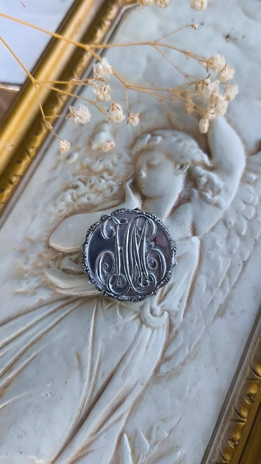 Broche colgante